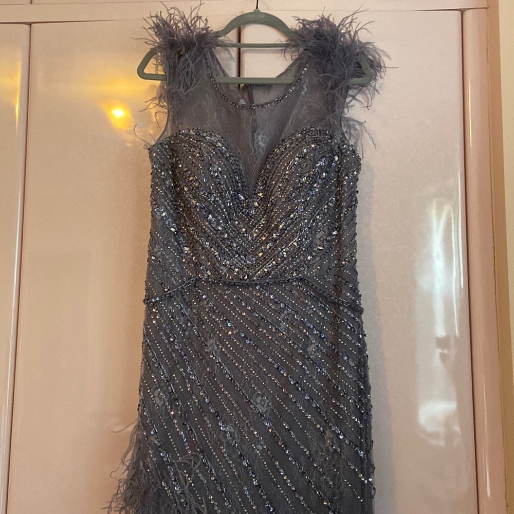 Jovani feather fringed cap sleeve gown beaded